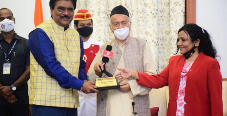 The Governor presented the 'Pillar of Democracy' award to dignitaries from various fields.